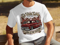 White t-shirt graphic with red lowrider truck, flames, roses, and text 