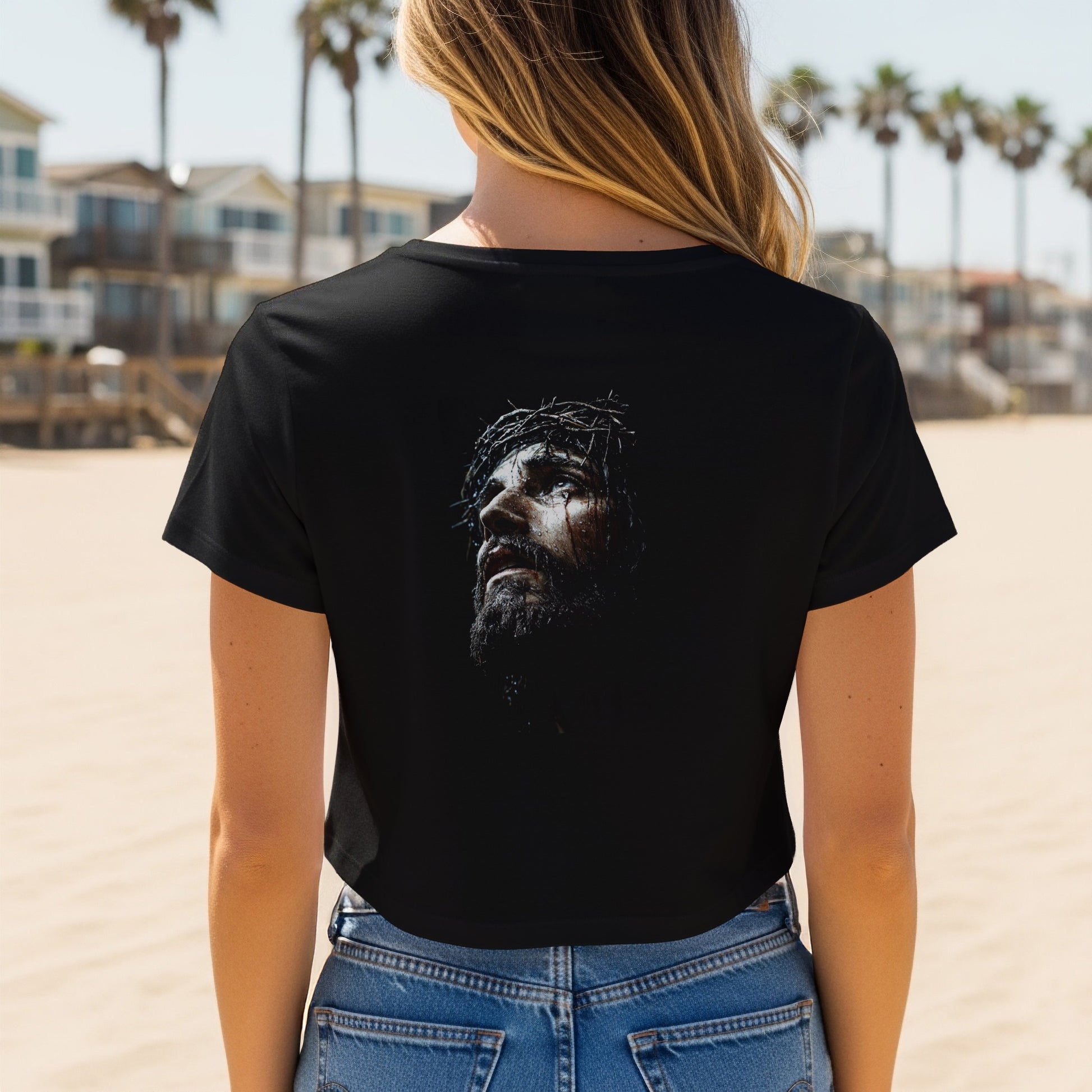 Black t-shirt with a graphic of Jesus wearing a crown of thorns.