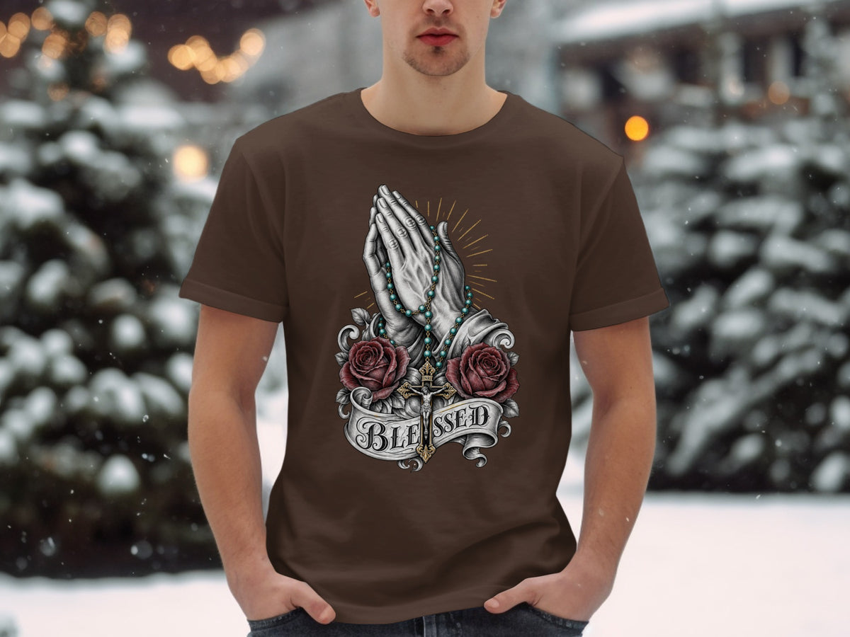 Brown t-shirt with praying hands, rosary, cross, roses, and the word BLESSED.