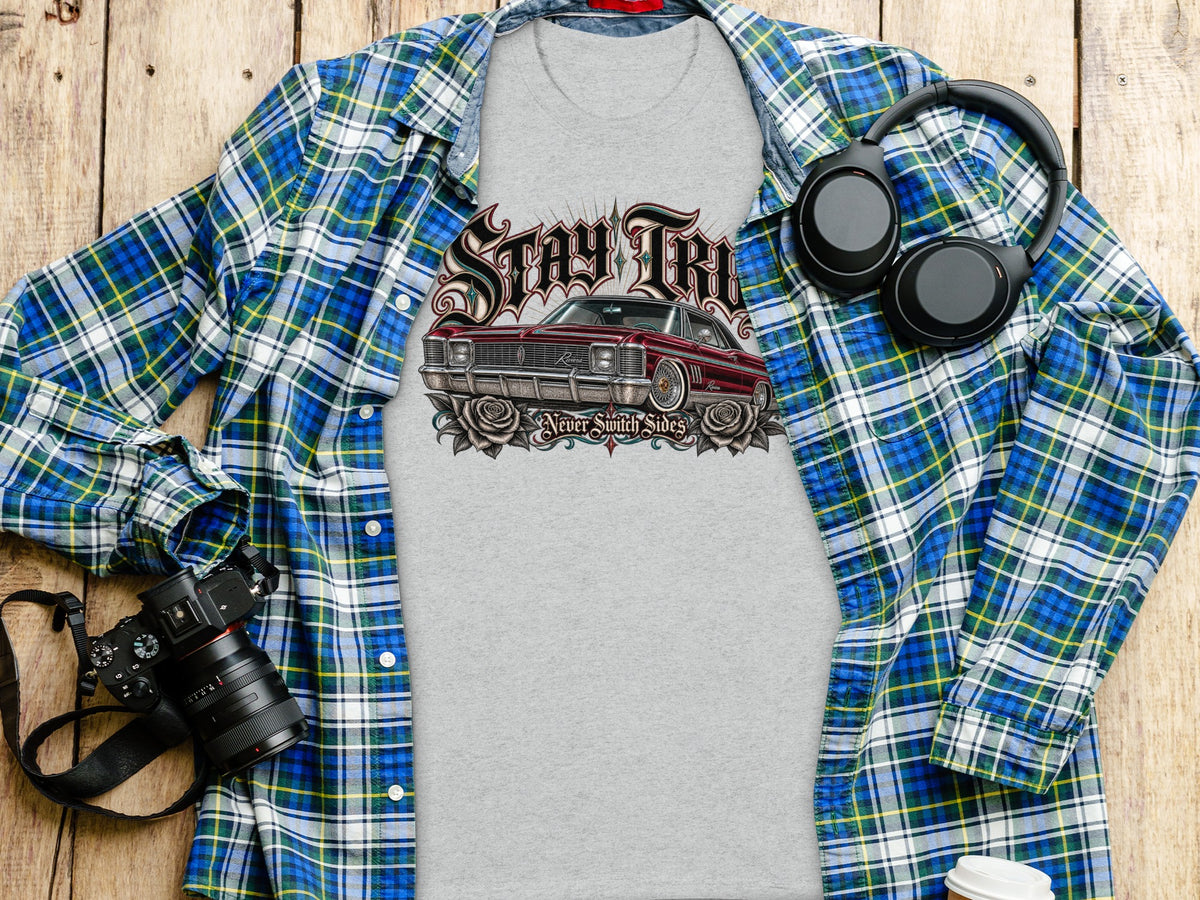 Grey t-shirt with a red vintage car graphic and "Stay Tri" text.