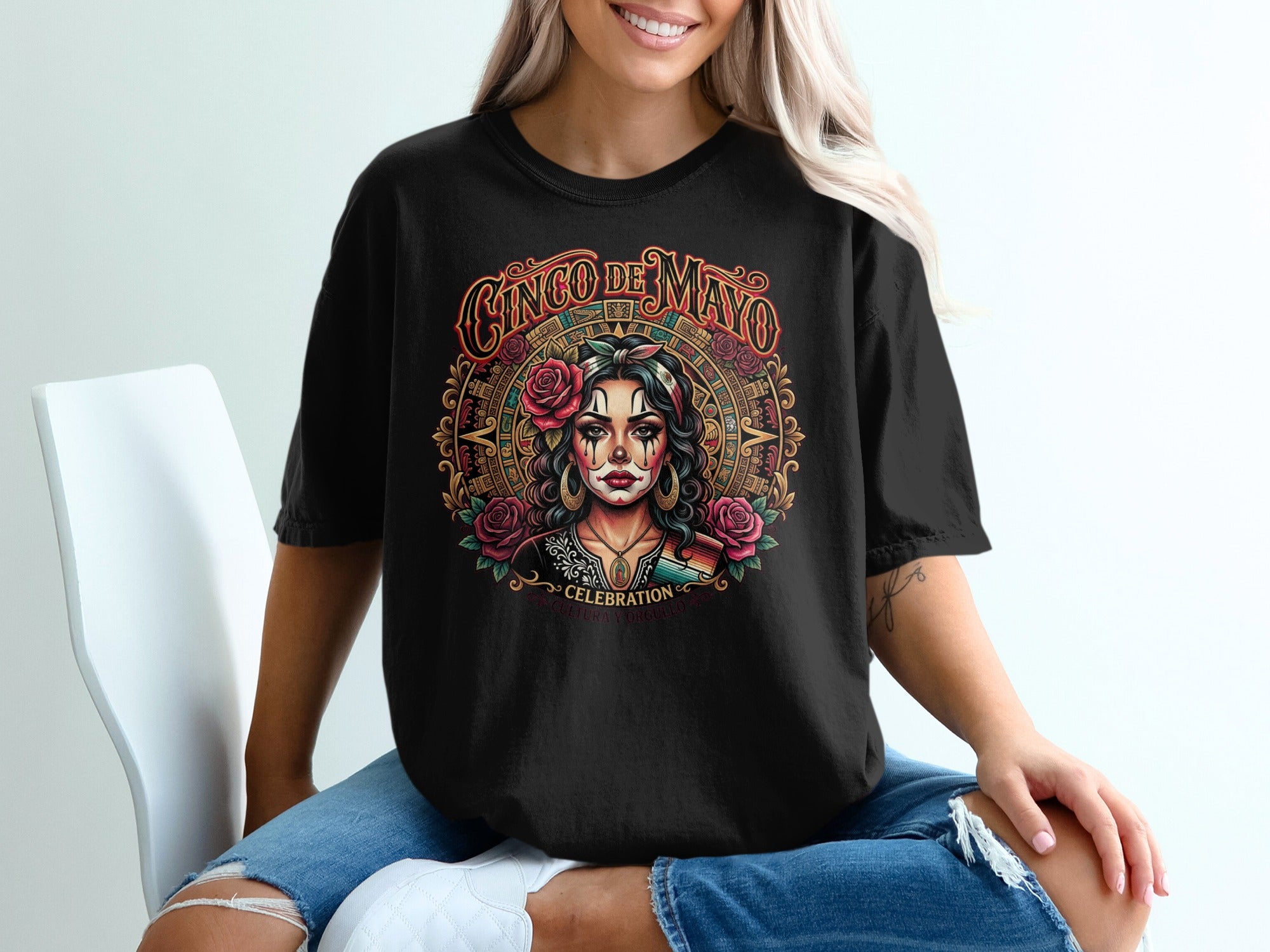 Black t-shirt with Cinco de Mayo graphic featuring a woman's face with floral makeup.