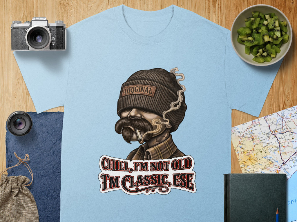 Light blue t-shirt with "ORIGINAL" and "CHILL, I'M NOT OLD I'M CLASSIC, ESE" graphics.