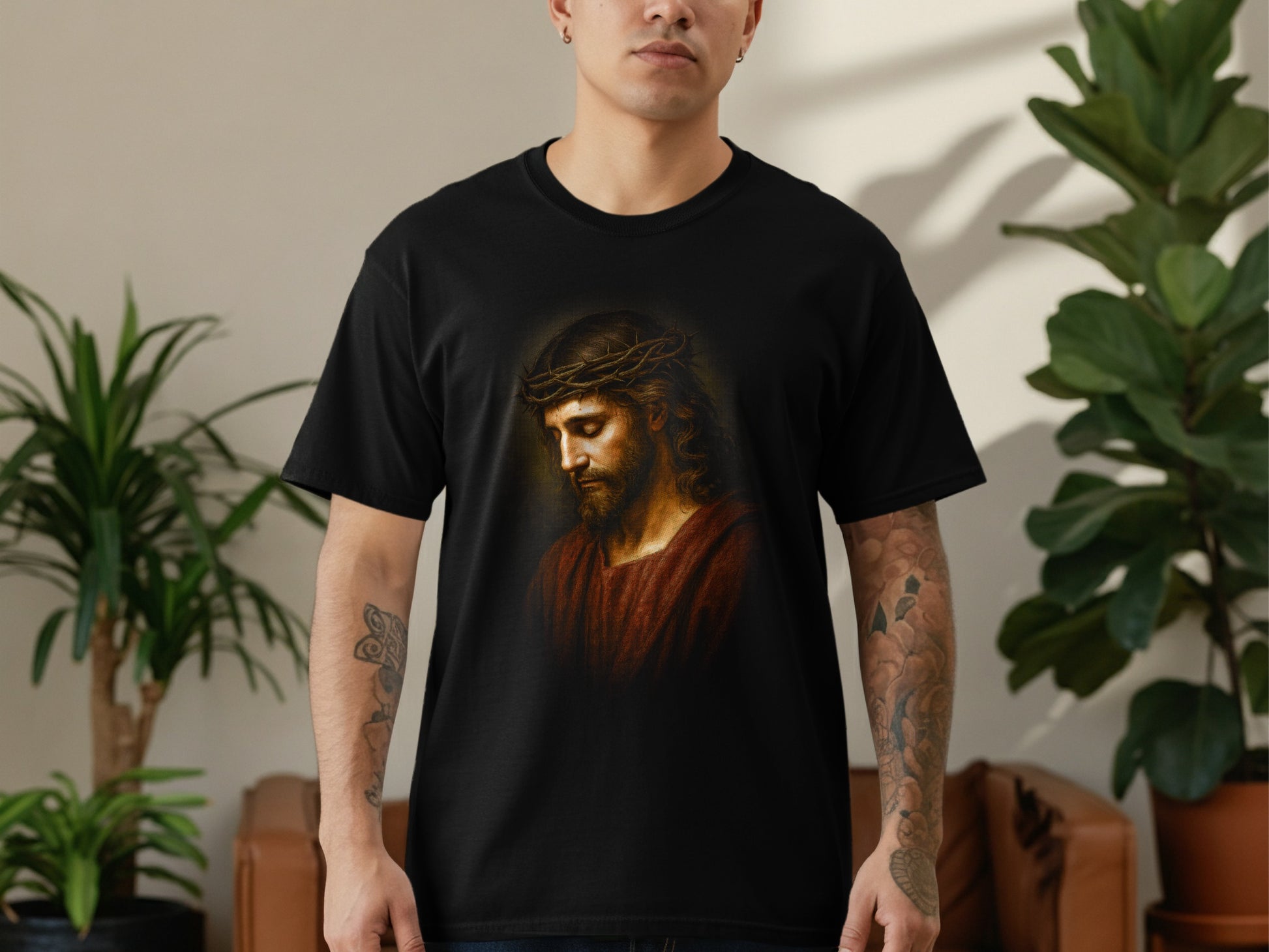 T-shirt featuring a close-up painting of Jesus Christ wearing a crown of thorns.