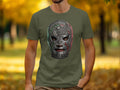 Green t-shirt featuring a metallic Lucha Libre mask with Mexican flag colors.