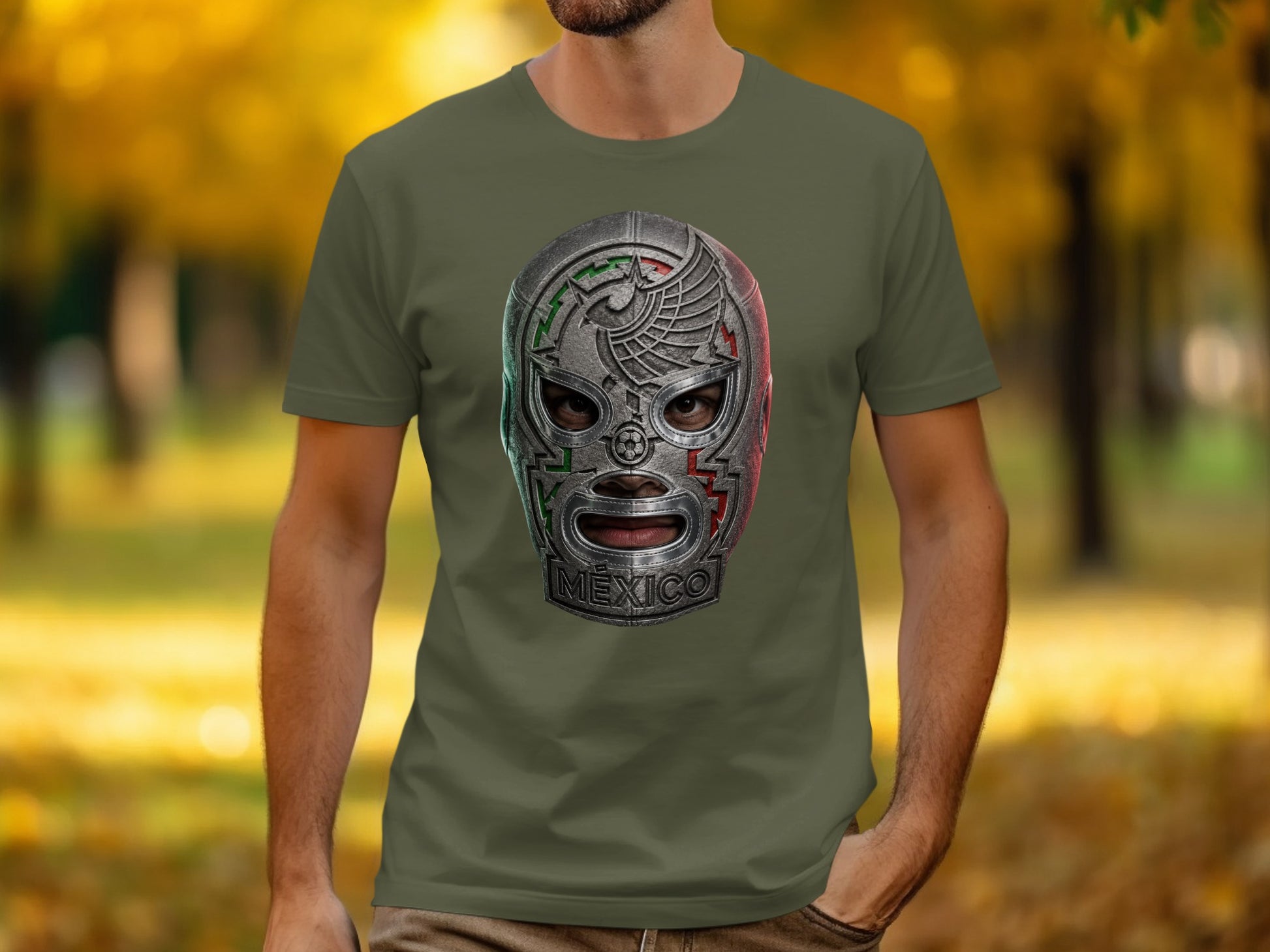 Green t-shirt featuring a metallic Lucha Libre mask with Mexican flag colors.