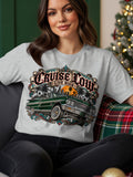 Gray t-shirt with graphic of green lowrider car and text 