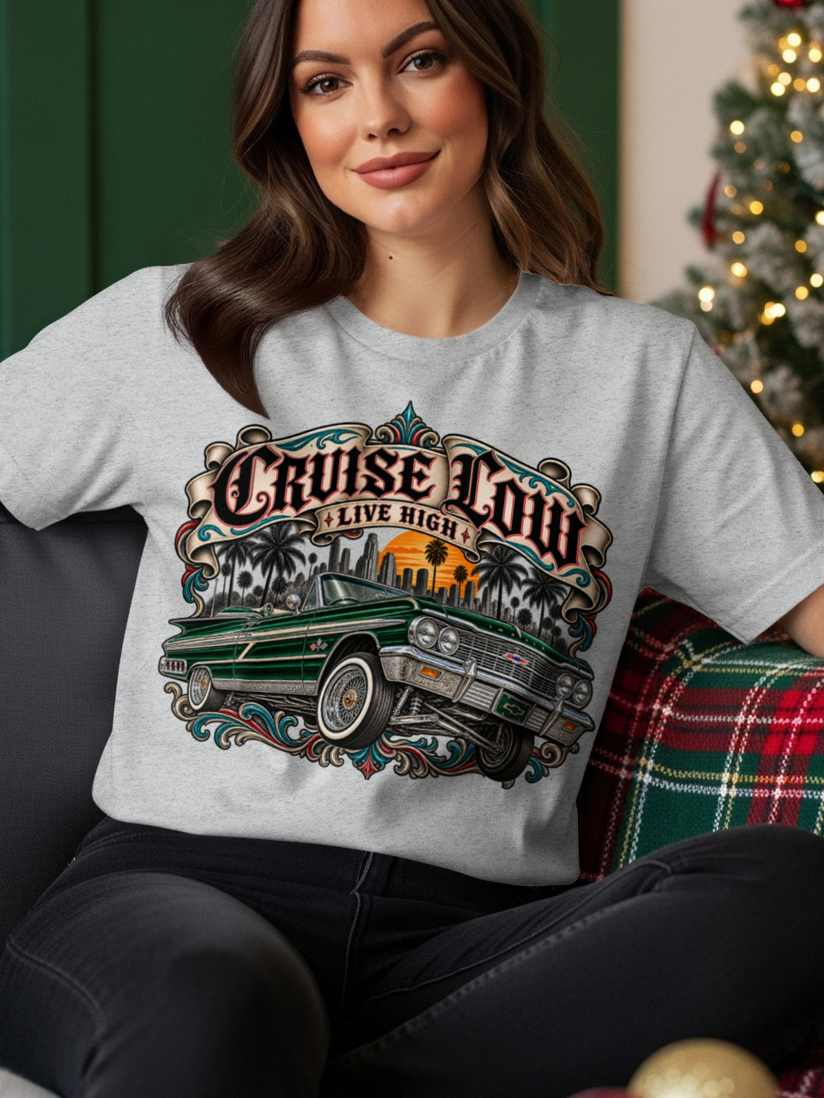 Gray t-shirt with graphic of green lowrider car and text "CRUISE LOW LIVE HIGH".