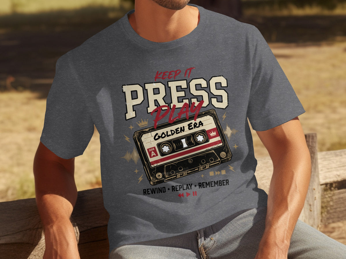 Graphic tee with "Keep it Press Play Golden Era" and cassette tape design.