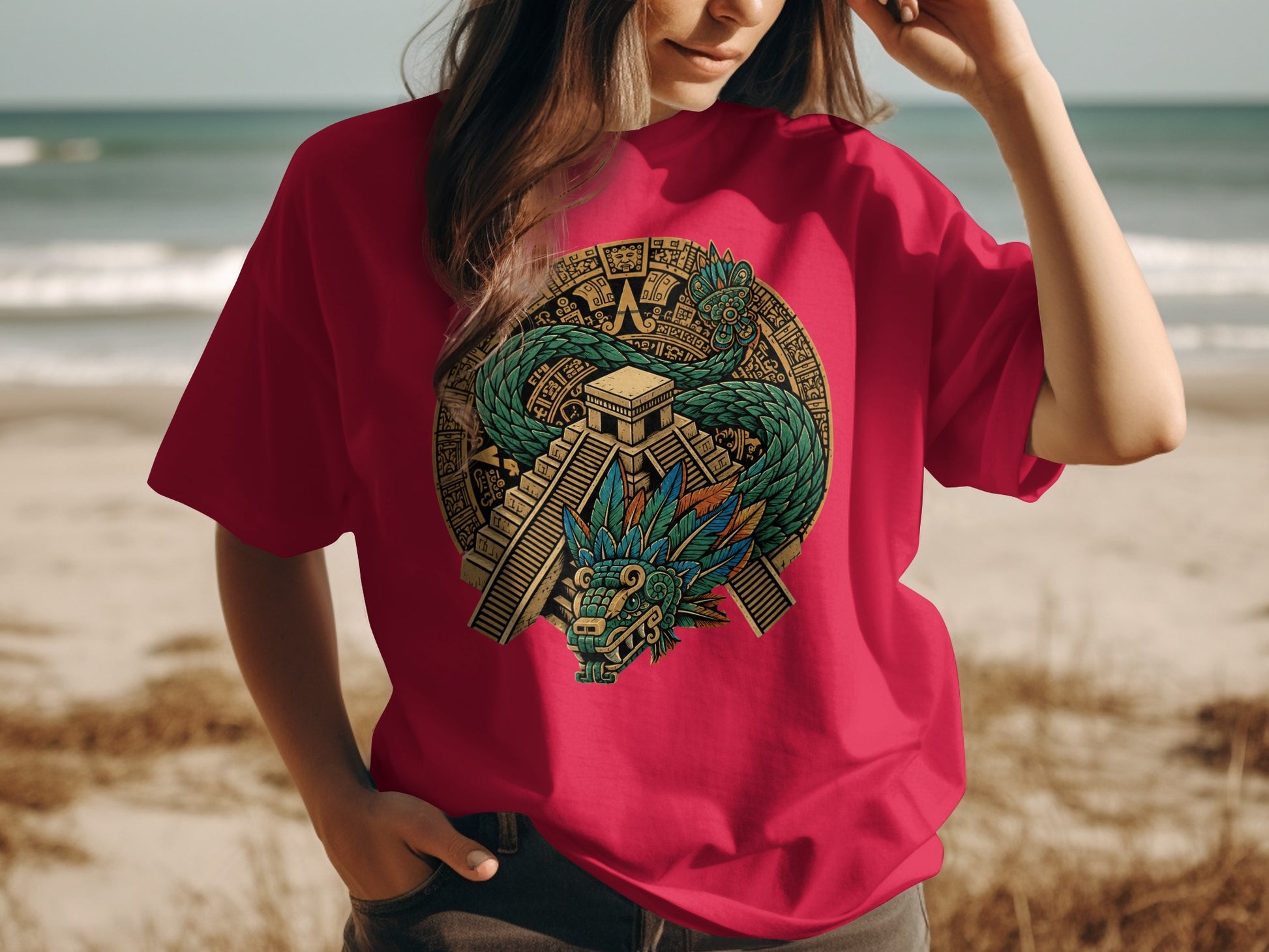 T-shirt featuring a vibrant Aztec sun stone design with a feathered serpent.
