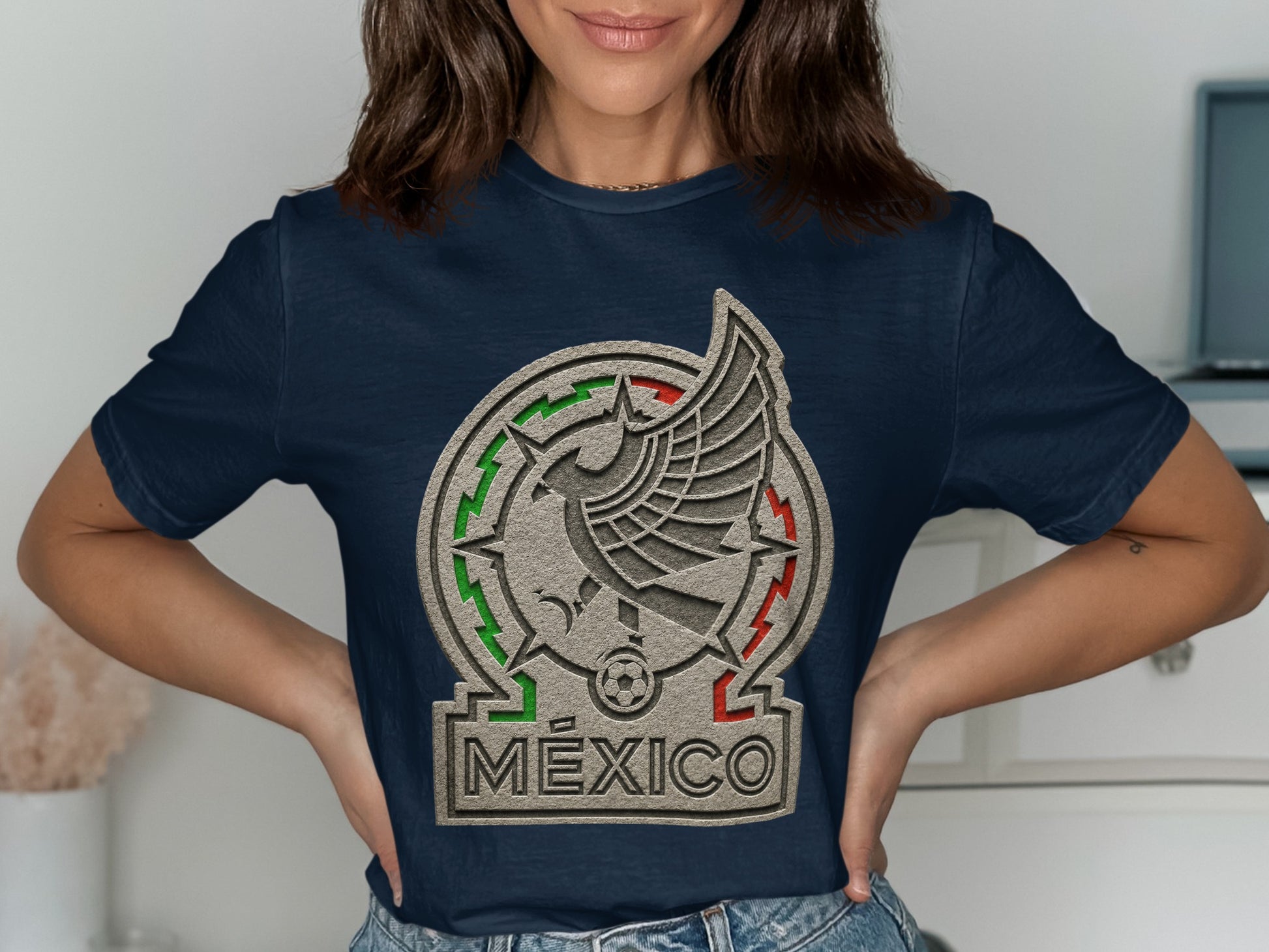 Navy t-shirt with Mexico national soccer team logo on chest.