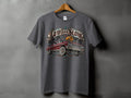 Graphic t-shirt with a lowrider car and text 