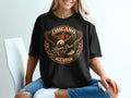 Black t-shirt with circular Chicano Brown Pride All Star eagle graphic.