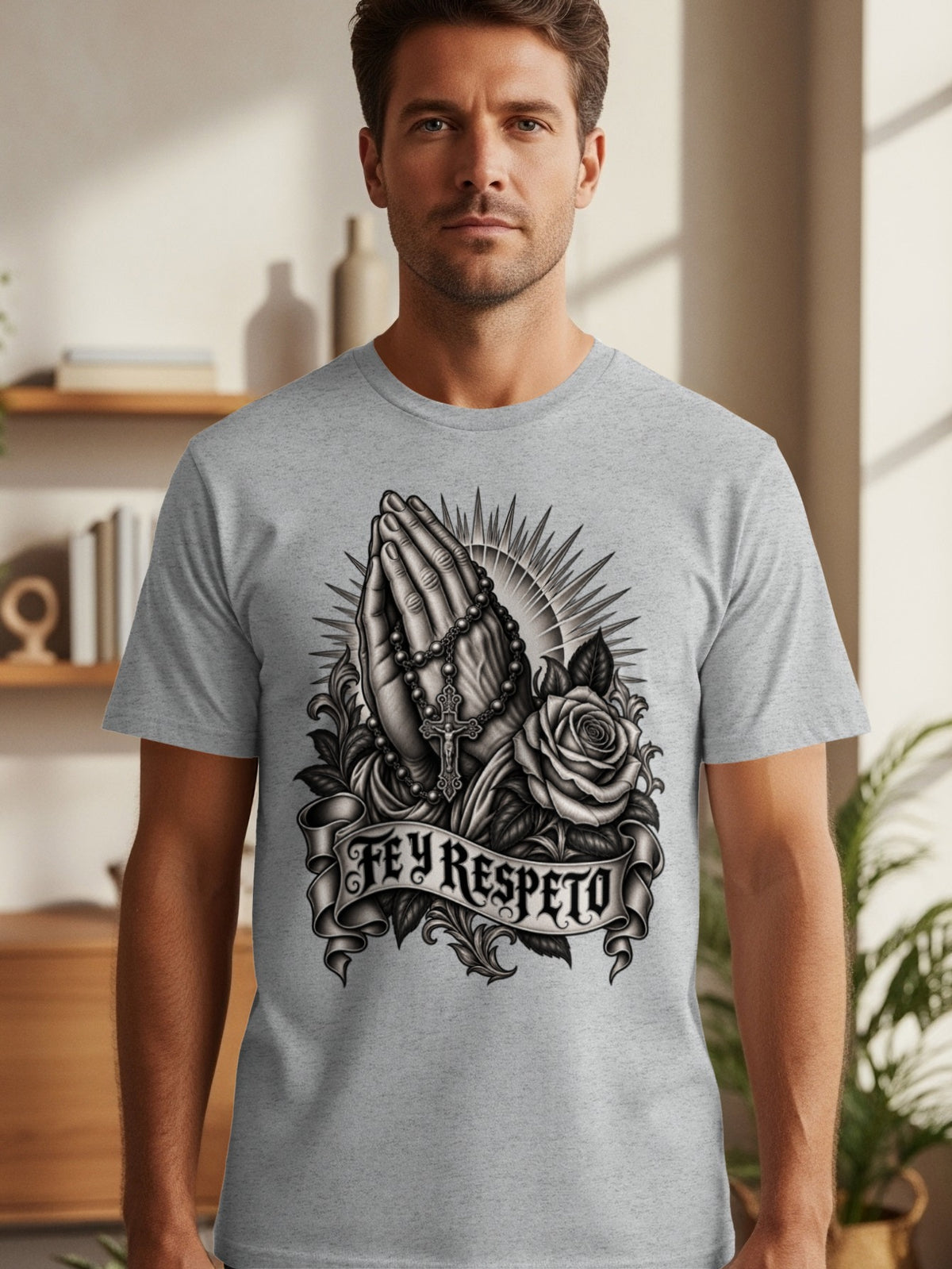 T-shirt with praying hands, rosary, rose, and banner with "Fey Respeto" text.