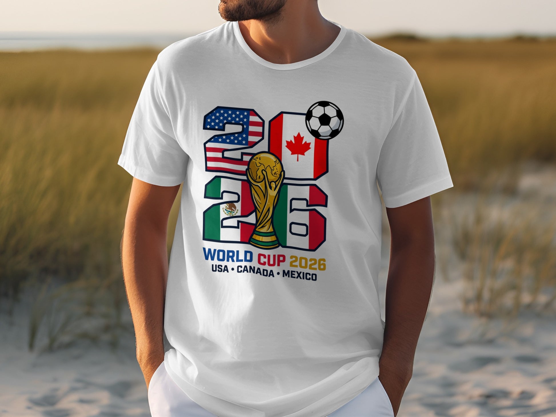 White t-shirt with 2026 World Cup logo, flags of USA, Canada, Mexico.