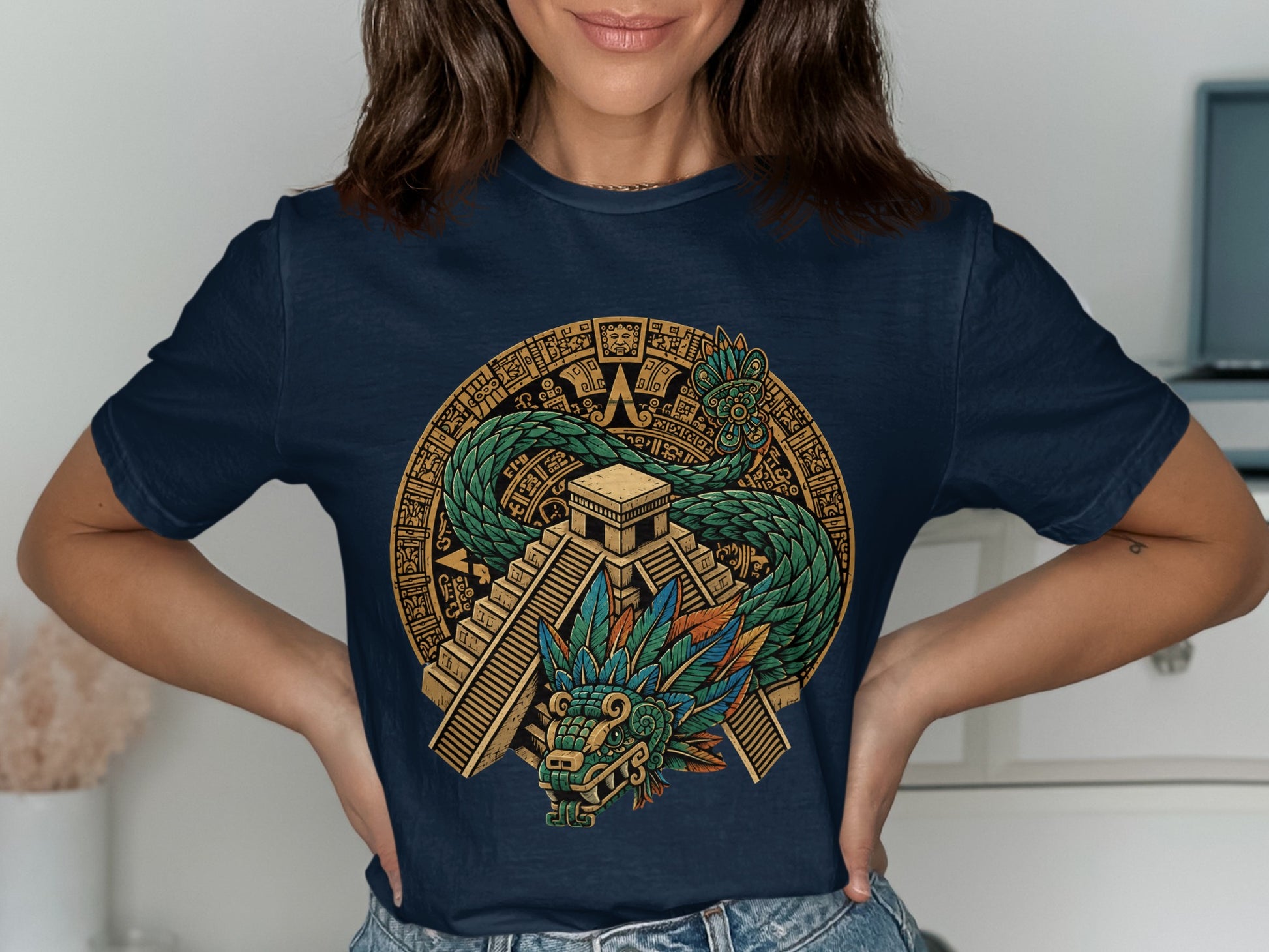 Navy t-shirt featuring a circular Aztec design with a feathered serpent and pyramid.