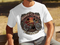 White t-shirt with a graphic of a red lowrider bicycle, roses, palm trees, and text.