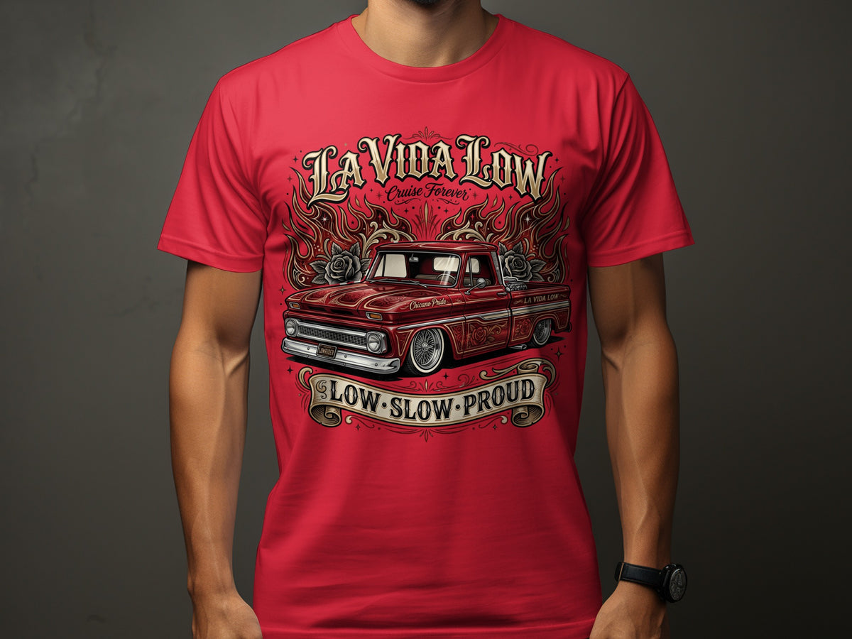 Red t-shirt with a graphic of a red lowrider truck and flames. Text reads "LA VIDA LOW" and "LOW SLOW PROUD".