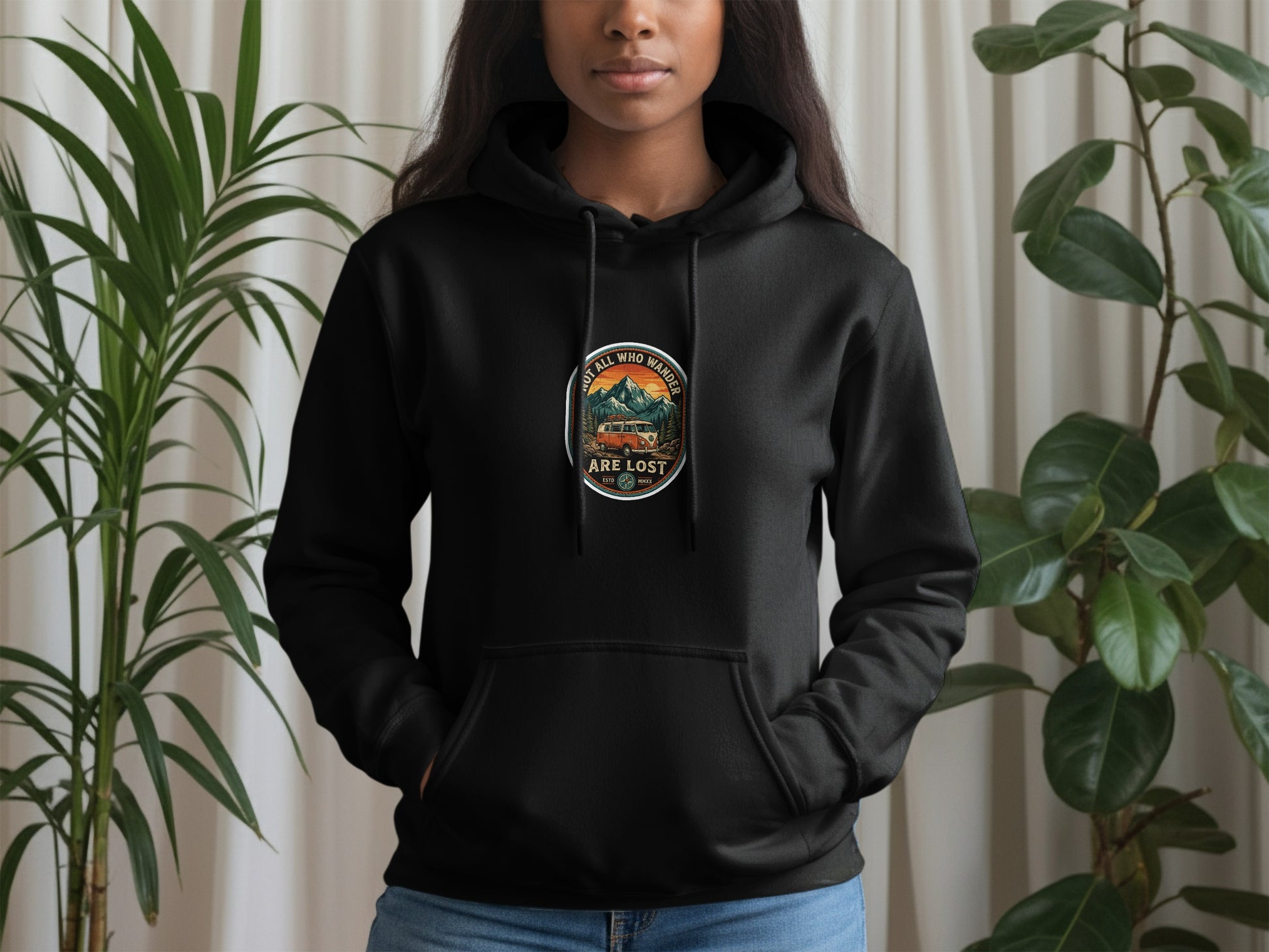 Black hoodie with "Not all who wander are lost" circular graphic featuring a van and mountains.