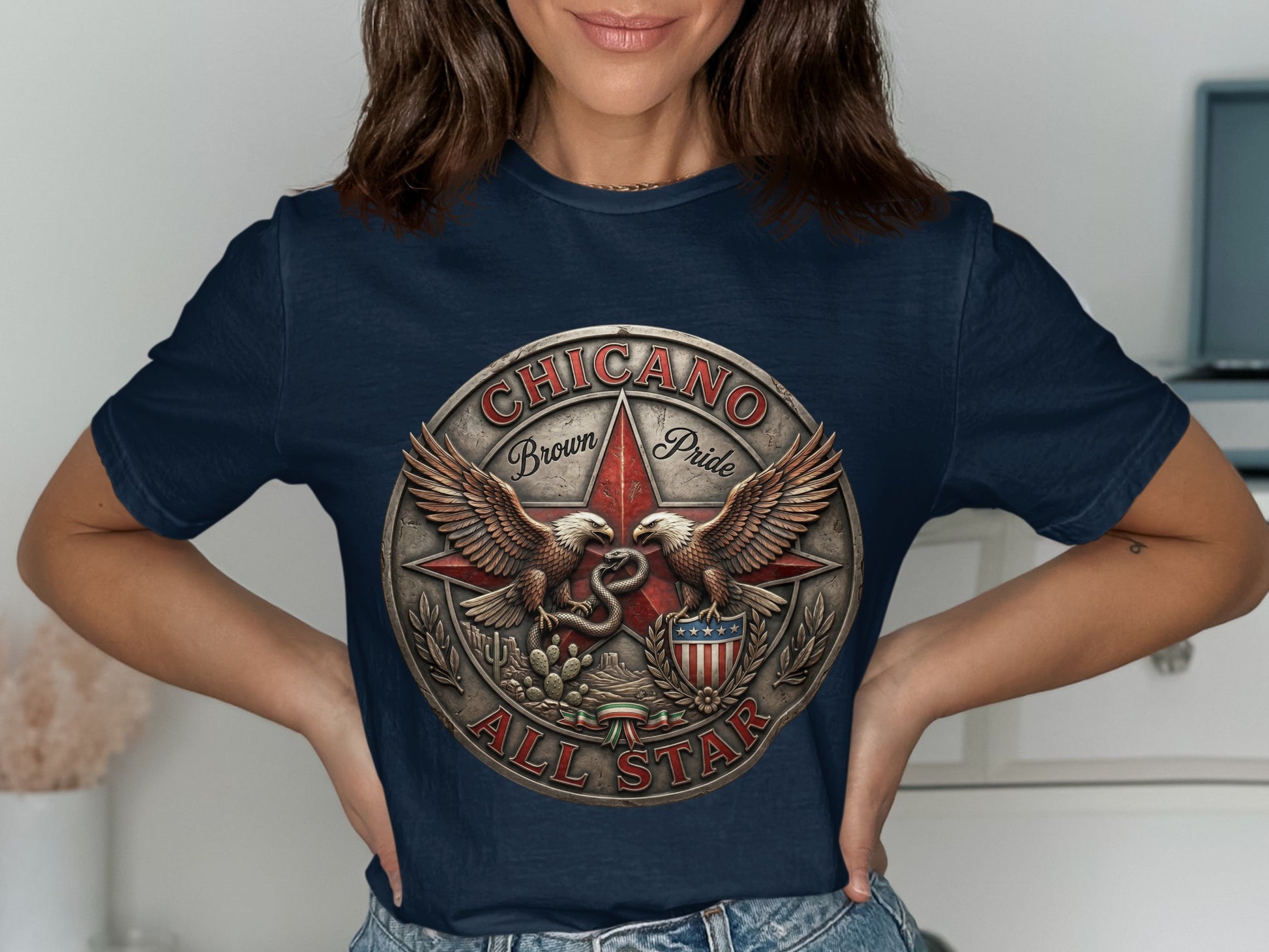 Navy t-shirt featuring a circular emblem with eagles, a snake, and "Chicano Brown Pride All Star."