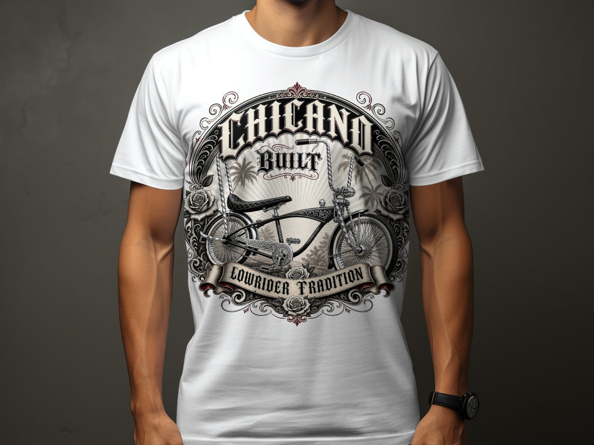 White t-shirt with "CHICANO BUILT LOWRIDER TRADITION" text and a lowrider bicycle graphic.