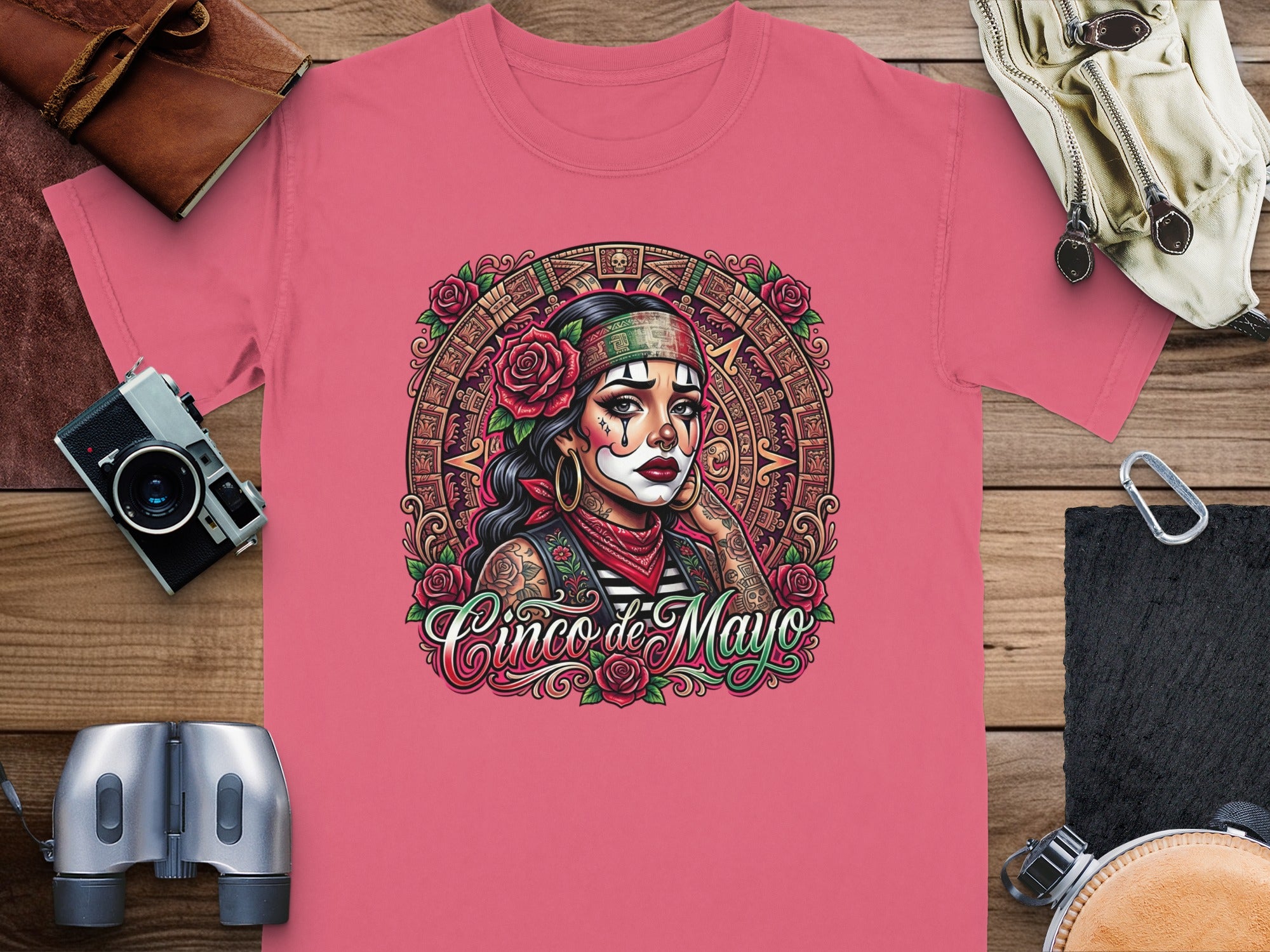 T-shirt with Cinco de Mayo skull artwork and floral accents.