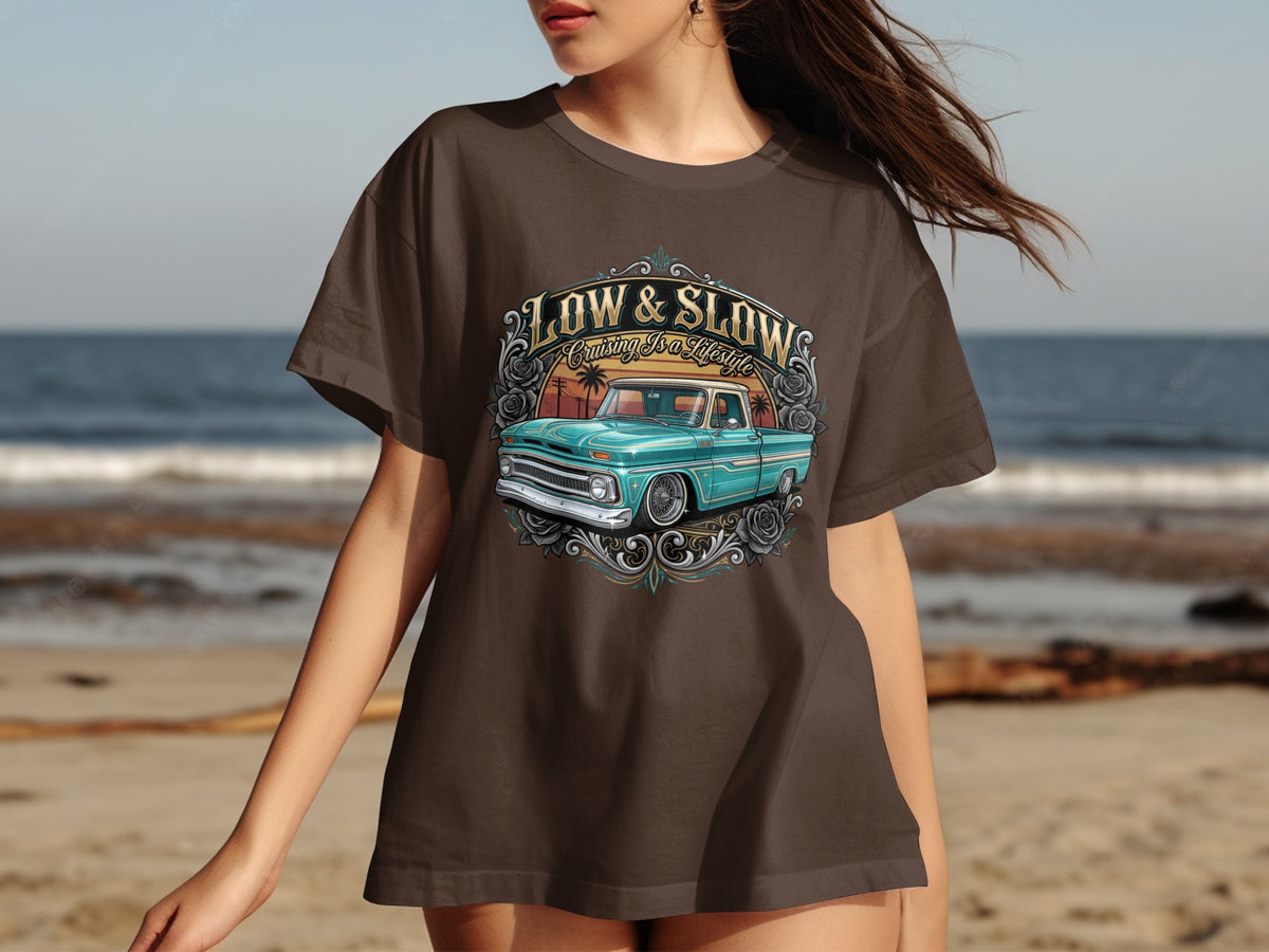 Brown t-shirt with a teal lowrider truck graphic and text "LOW & SLOW".