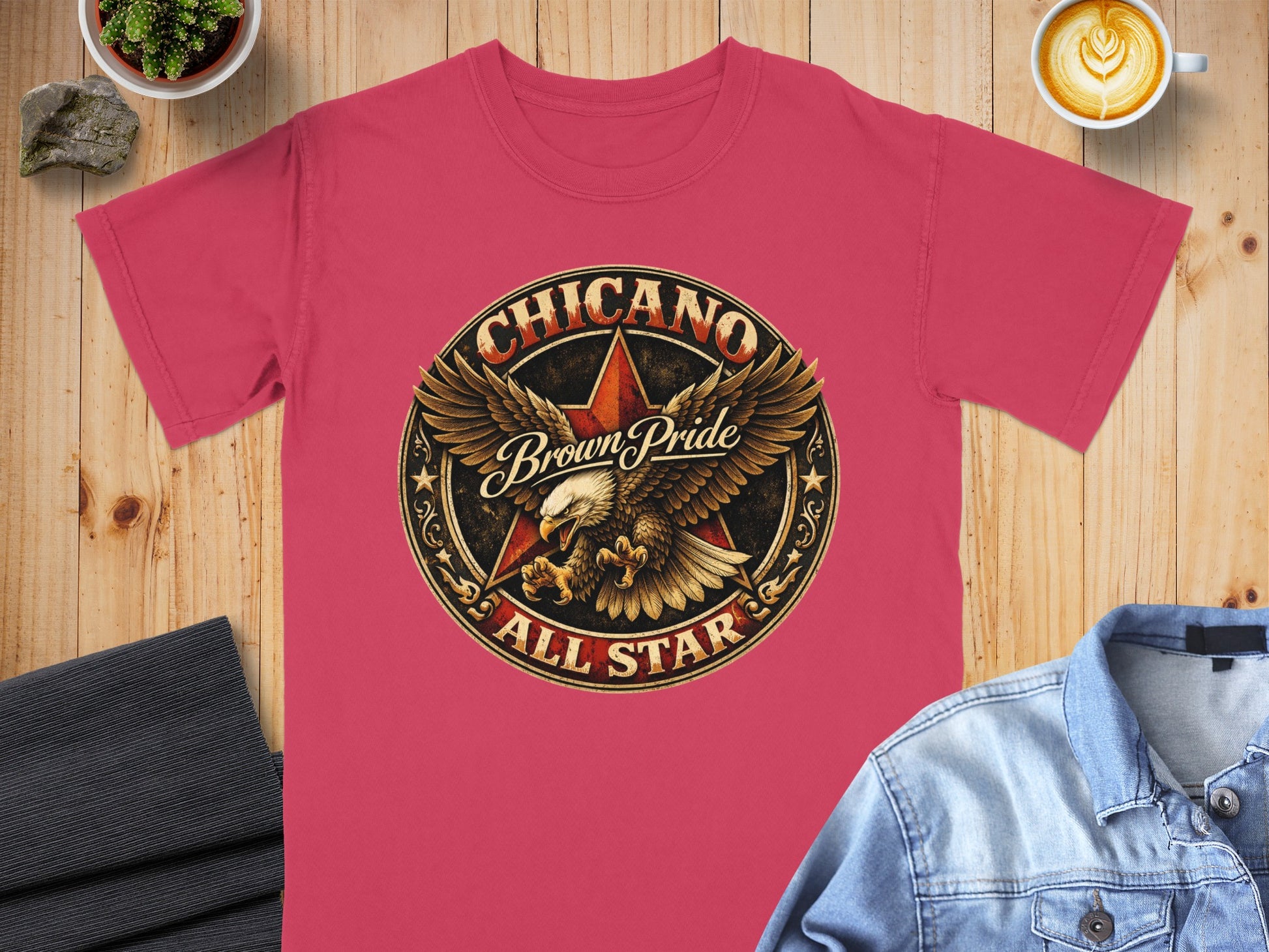 Crimson t-shirt with a circular brown pride eagle graphic and text.