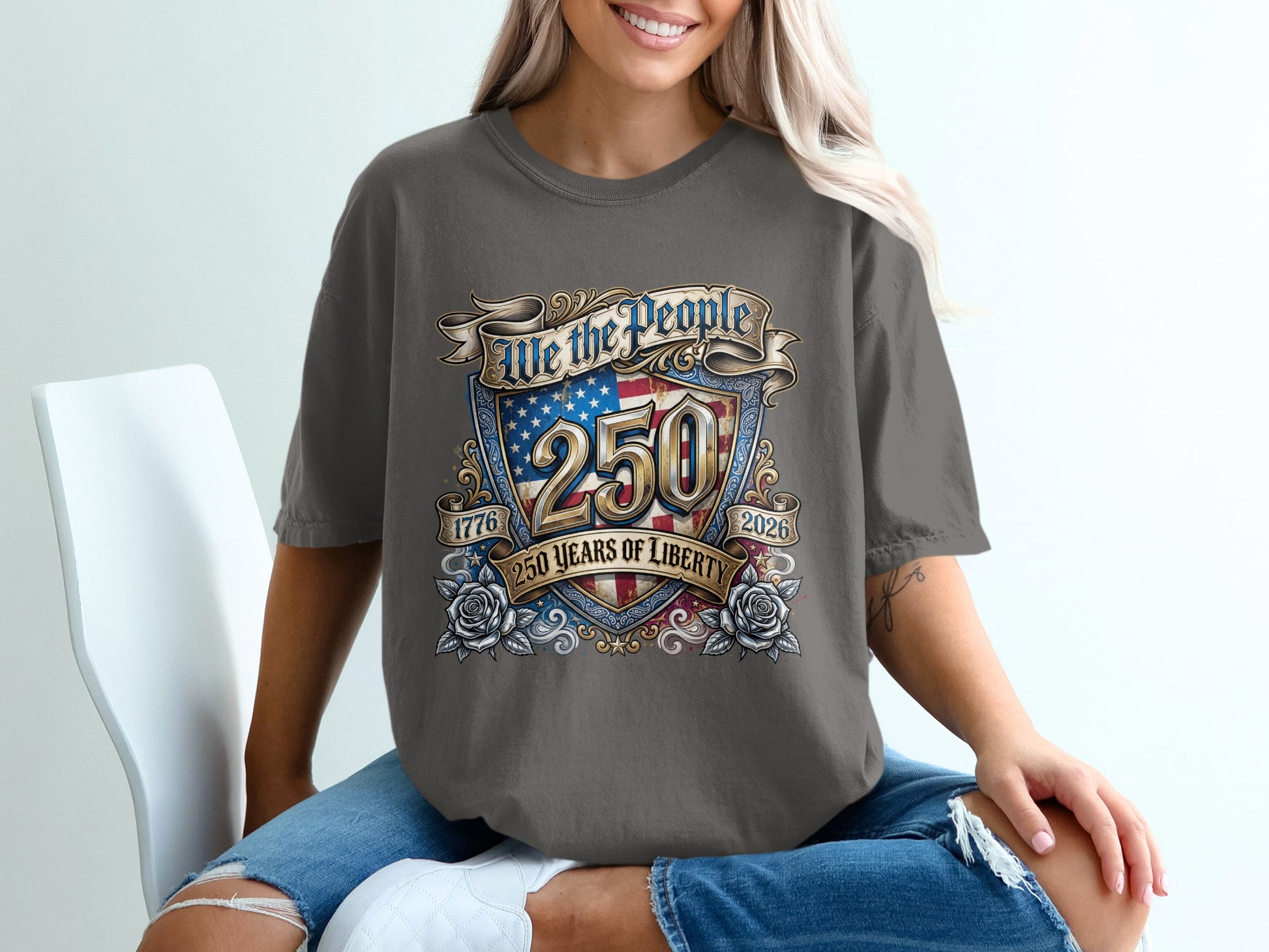 Gray t-shirt with "We the People 250 Years of Liberty" patriotic emblem.