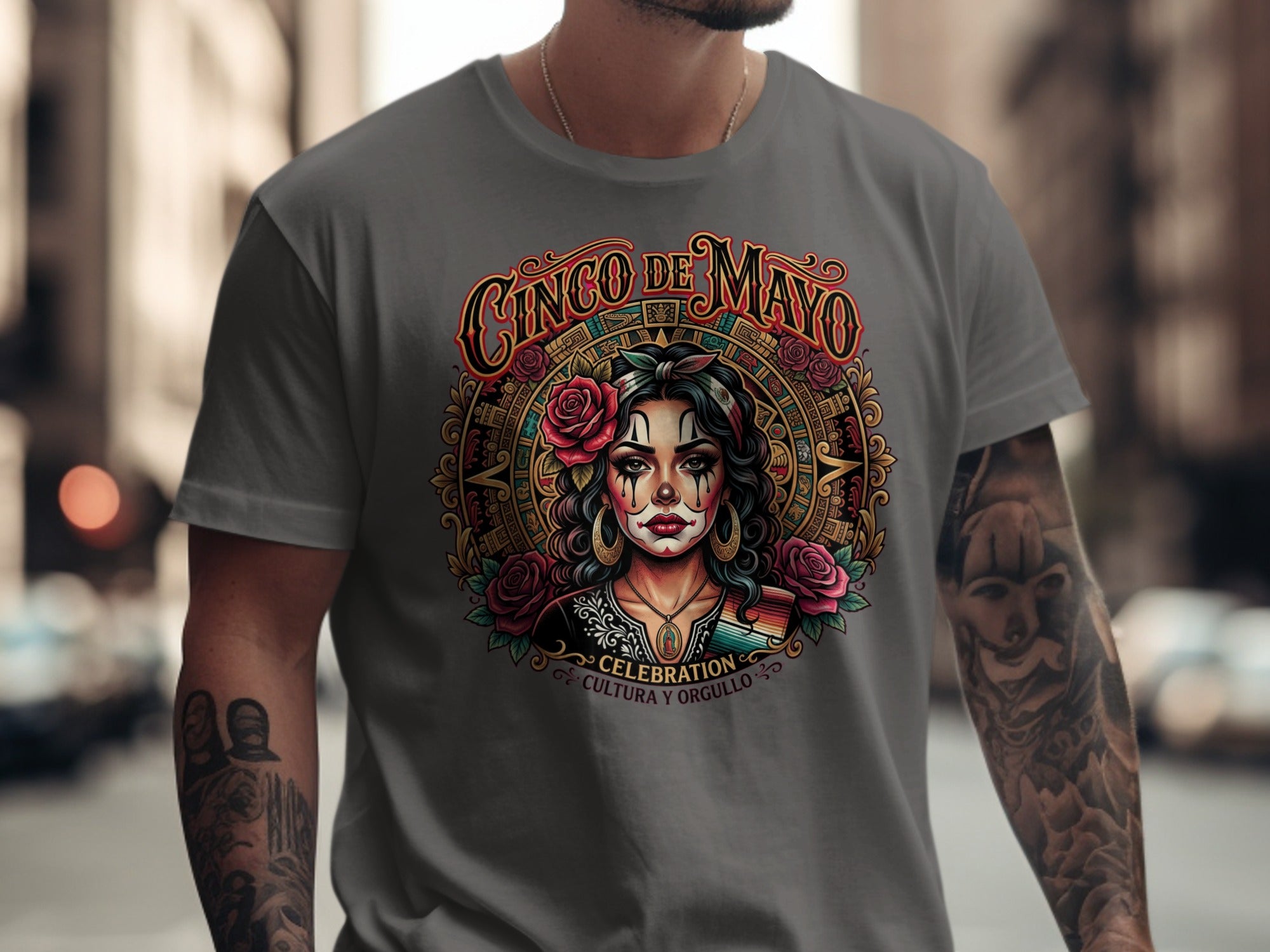 Cinco de Mayo graphic tee with woman's portrait, roses, and "Cultura y Celebracion" text.