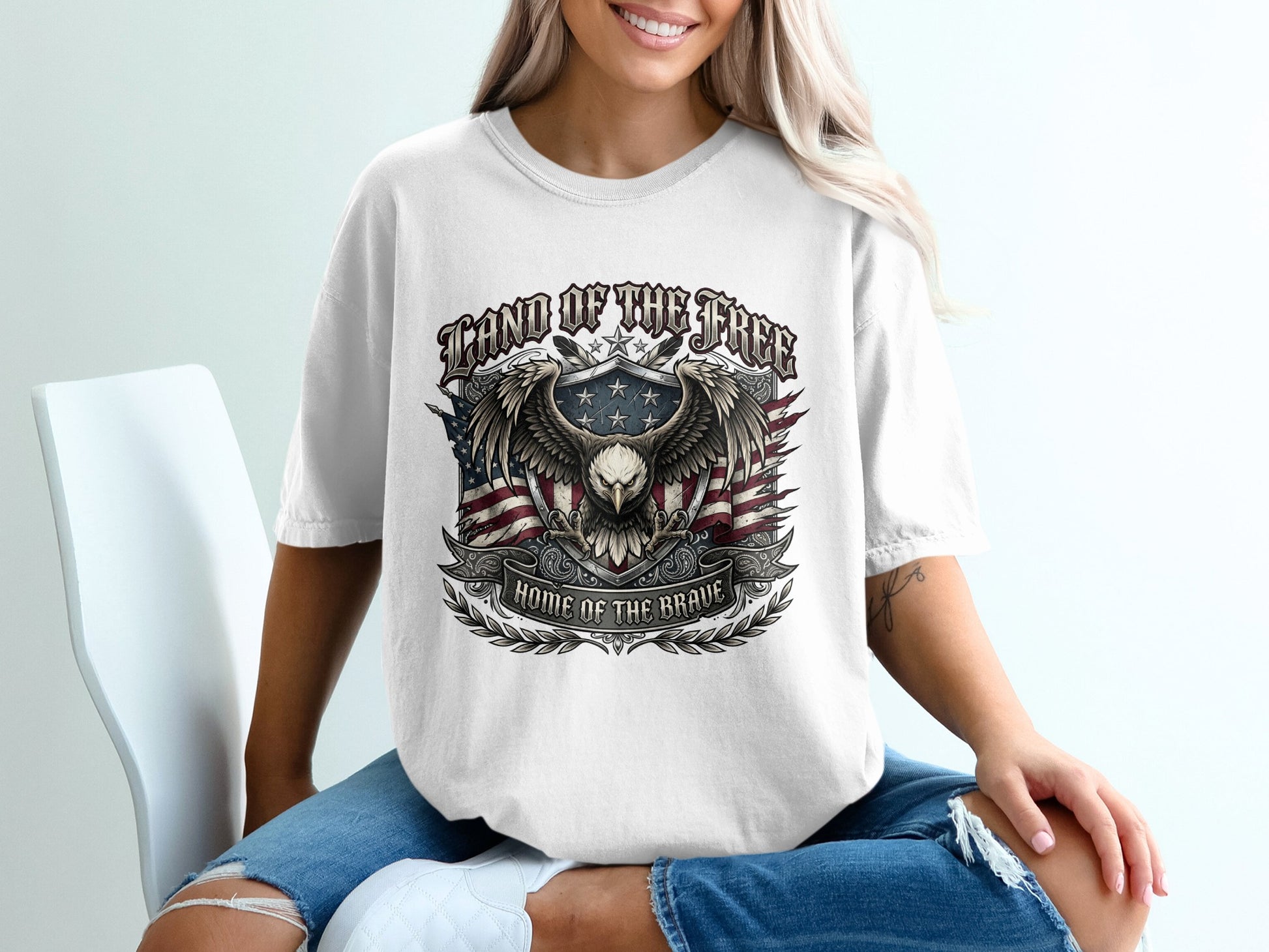 White t-shirt with eagle and "Land of the Free, Home of the Brave".