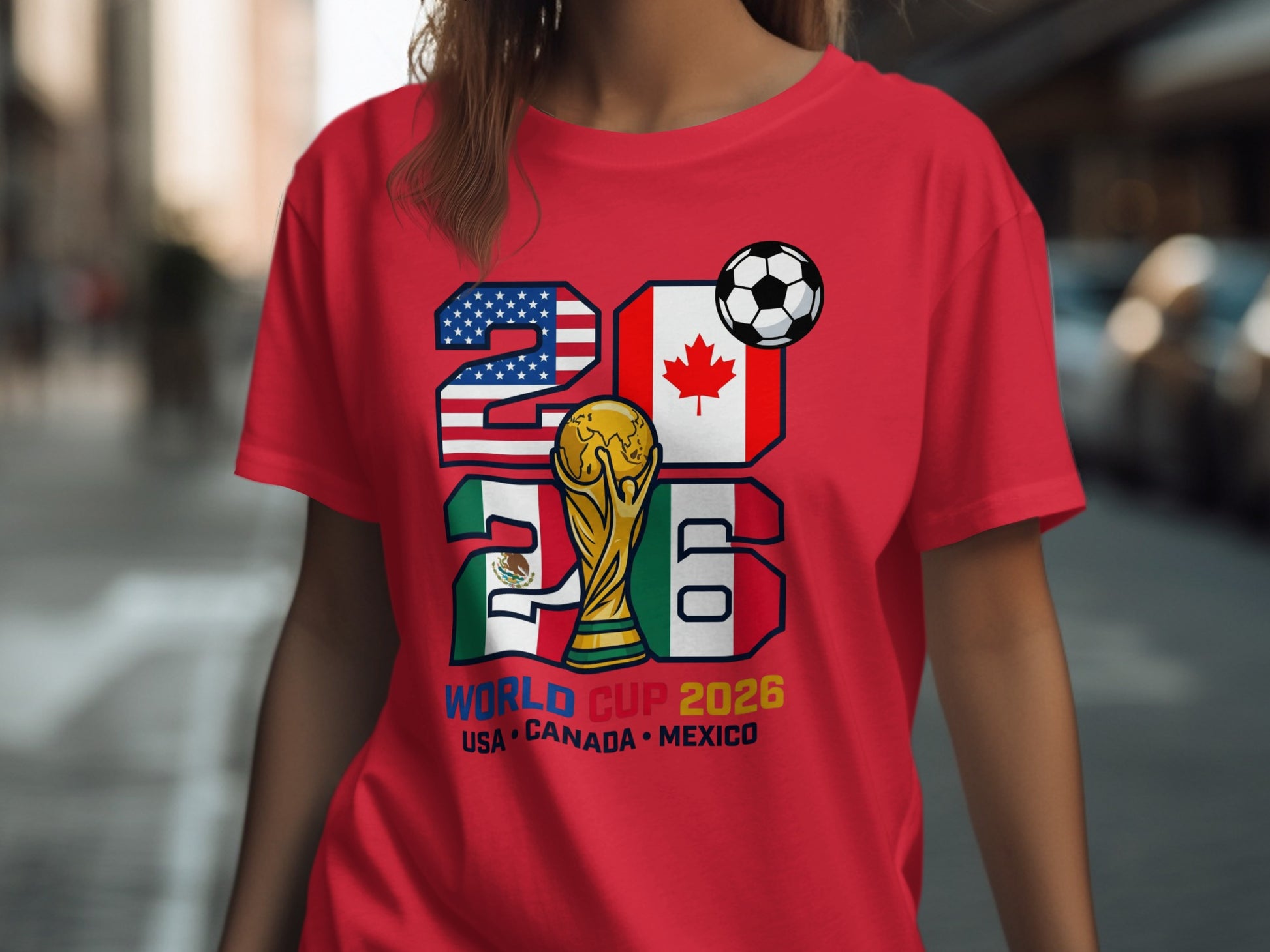 2026 World Cup USA Canada Mexico graphic t-shirt with trophy and soccer ball.