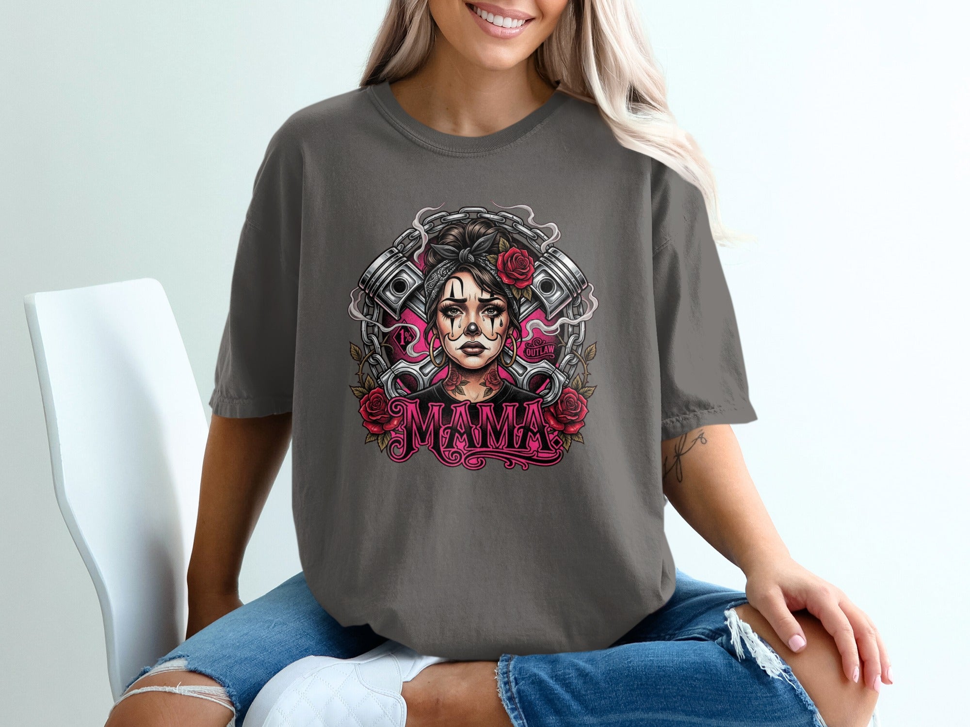 Tattooed mama portrait with roses, pistons, and "mama" text.