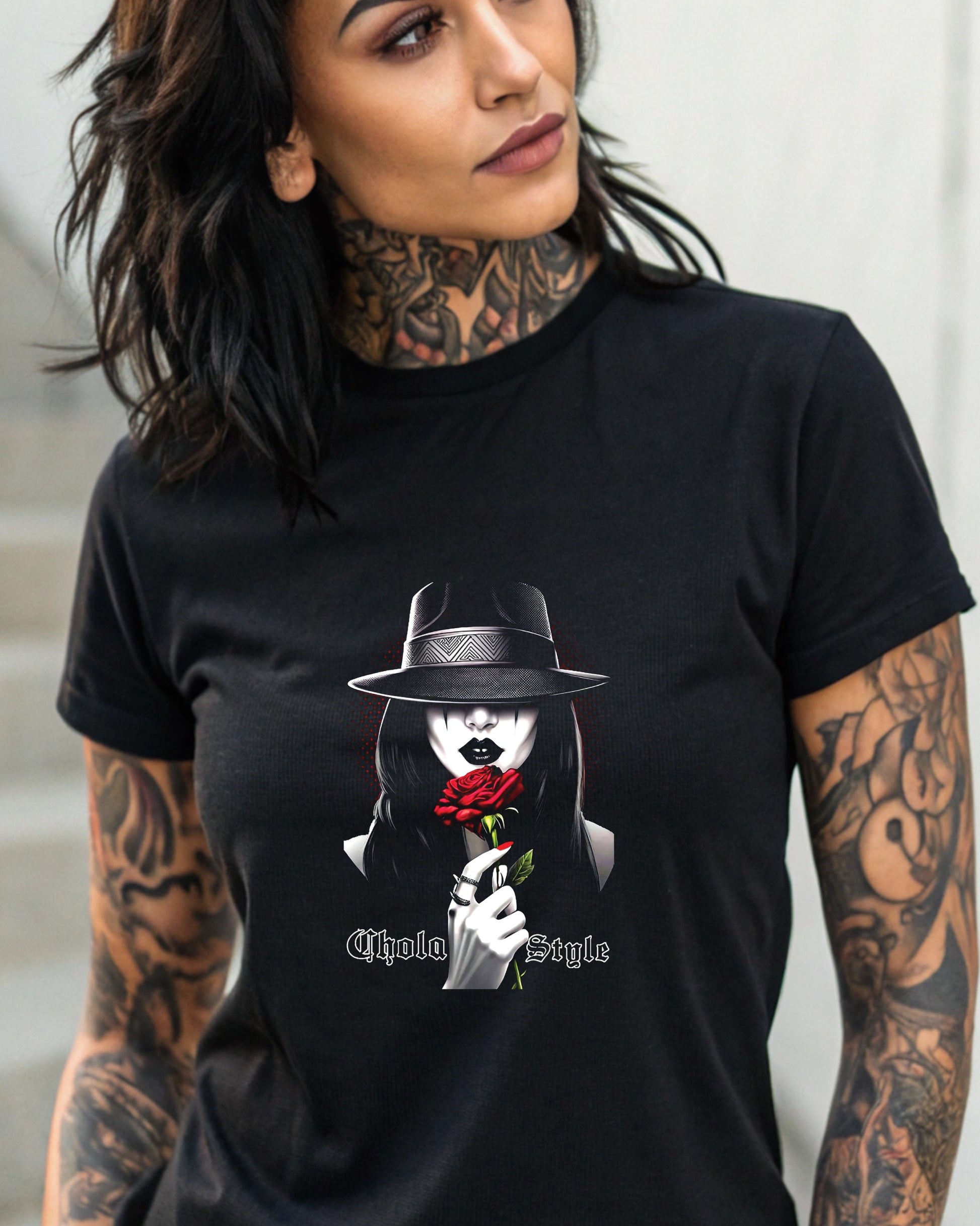 Woman in hat holding a red rose, "Chola Style" text.