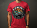 Red t-shirt with a graphic of a bicycle and the text 