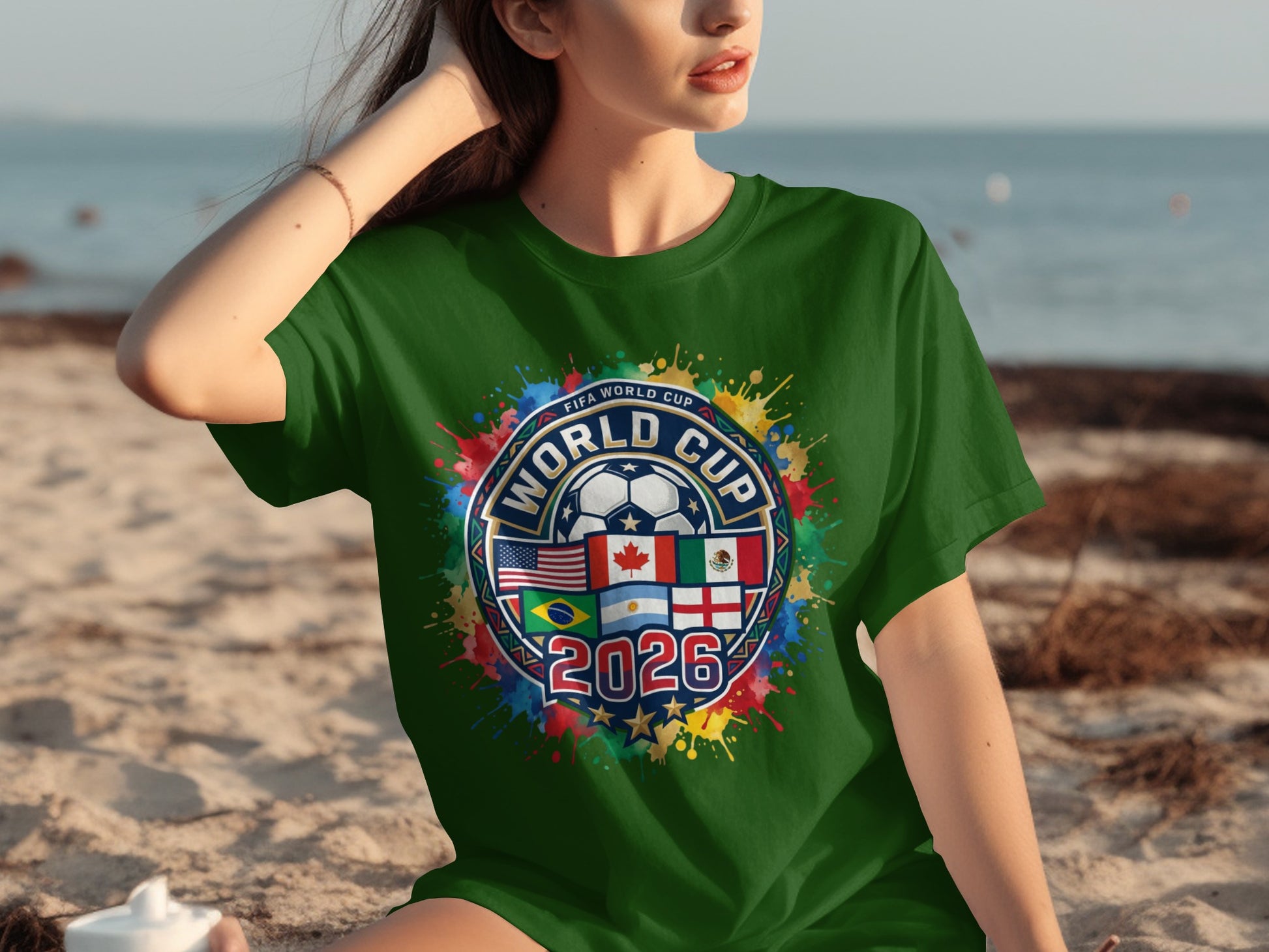 Green t-shirt with FIFA World Cup 2026 logo featuring flags of host nations.