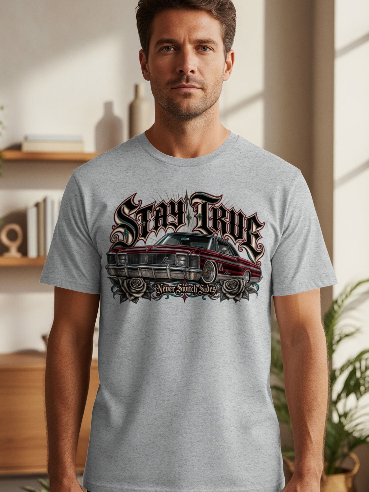 T-shirt graphic with red lowrider car, roses, and "Stay True" text.