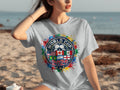 Grey t-shirt featuring FIFA World Cup 2026 logo with country flags and colorful paint splatters.