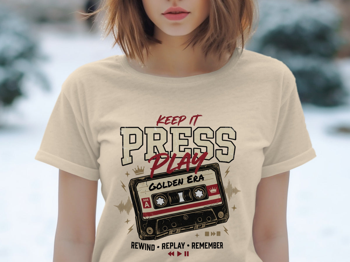 T-shirt with "Keep It Press Play Golden Era" text and cassette tape graphic.