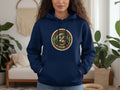 Navy blue hoodie with a circular graphic featuring dice, snakes, and text.