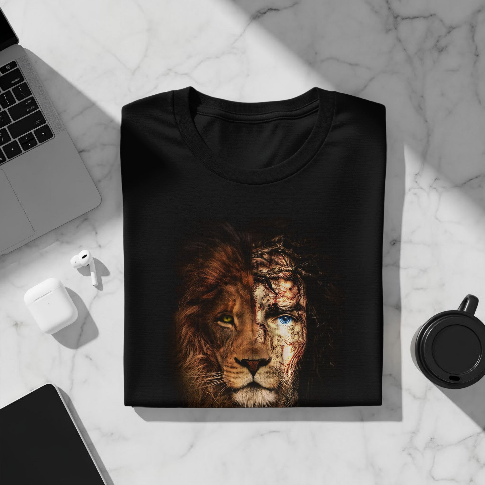 Black t-shirt with split image of a lion and Jesus Christ wearing a crown of thorns.