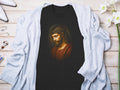 Black t-shirt featuring Jesus Christ wearing a crown of thorns.