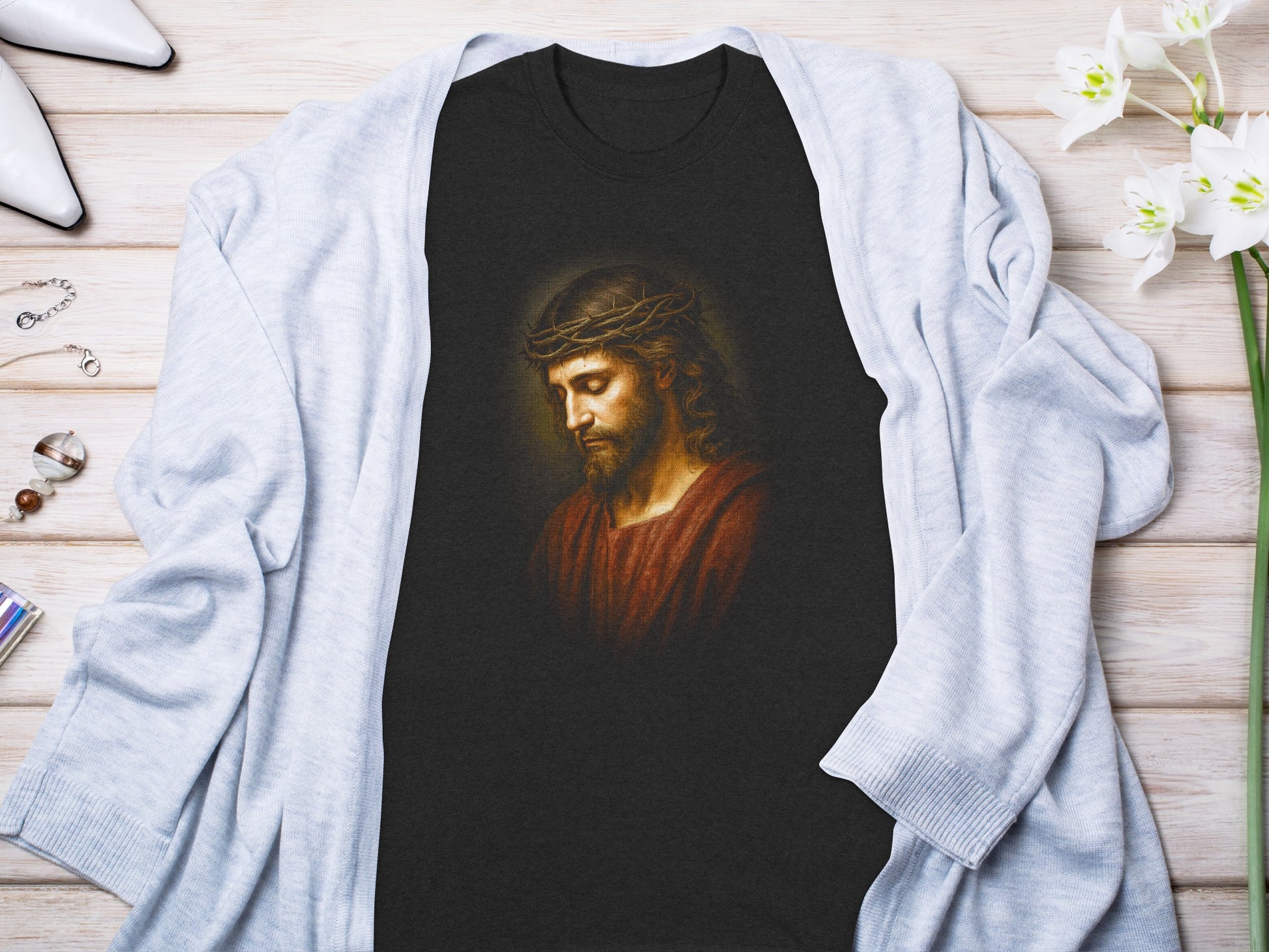 Black t-shirt featuring Jesus Christ wearing a crown of thorns.