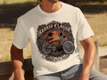 Cream t-shirt featuring a red lowrider bicycle graphic with text 