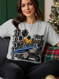 Gray t-shirt with a blue lowrider car and palm trees graphic that says 