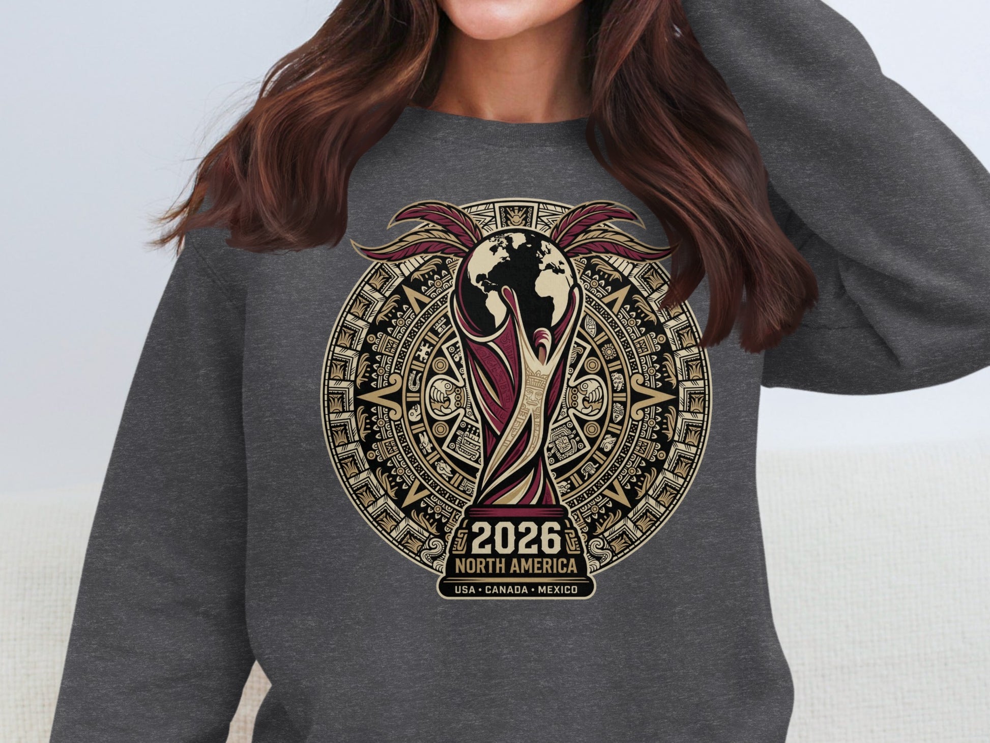 2026 FIFA World Cup North America USA Canada Mexico trophy emblem on gray sweatshirt.