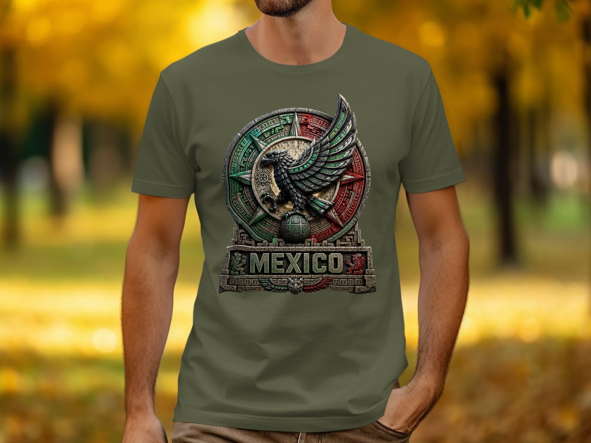 Olive green t-shirt with an eagle and sun emblem, text "MEXICO" below.
