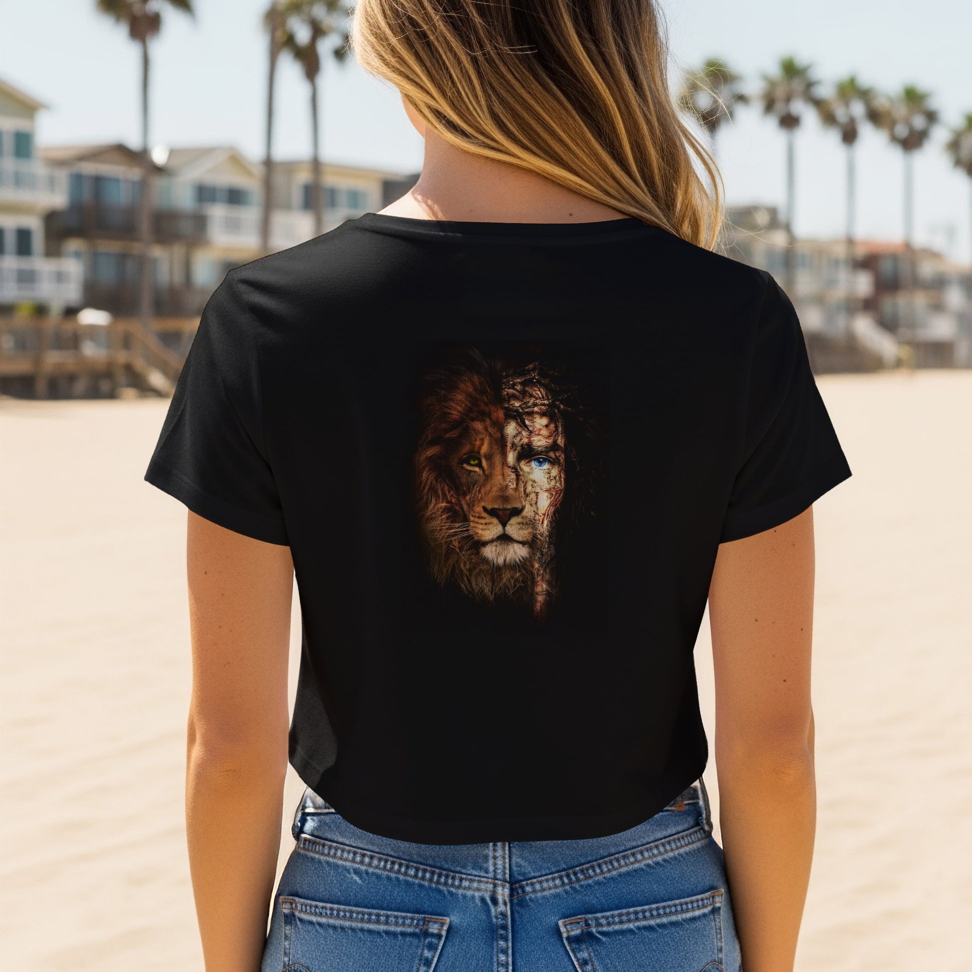 Black t-shirt featuring a half-lion, half-human face graphic.