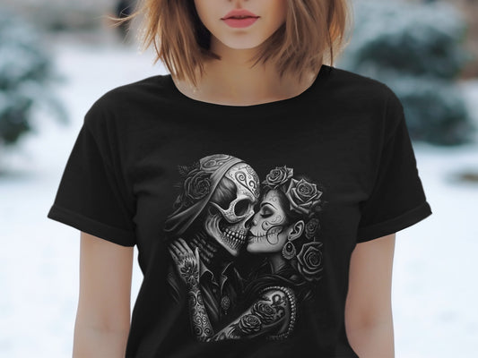 T-shirt with sugar skull couple embrace, adorned with roses and tattoos.
