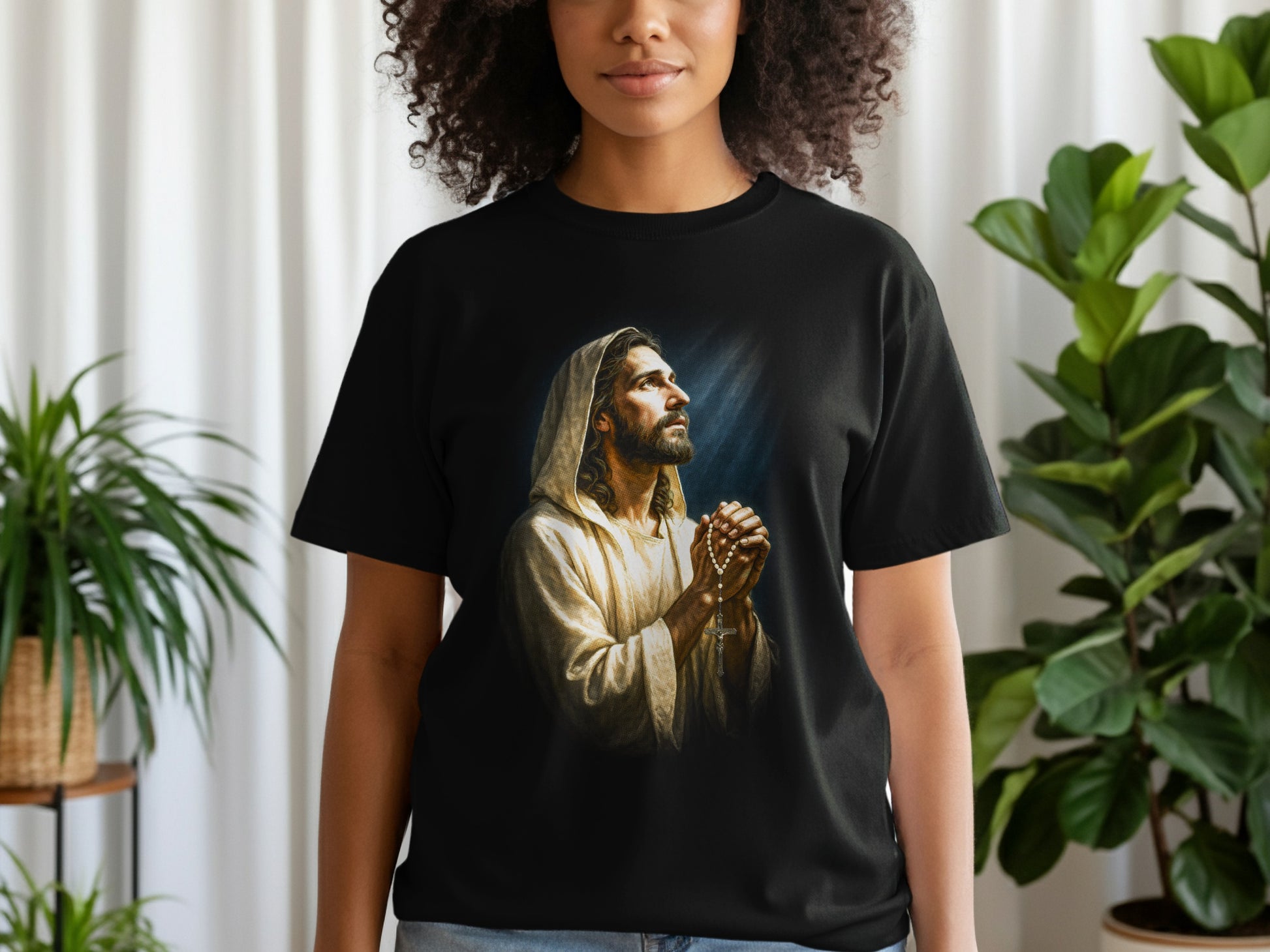Jesus wearing a robe, hands clasped in prayer, looking upwards.
