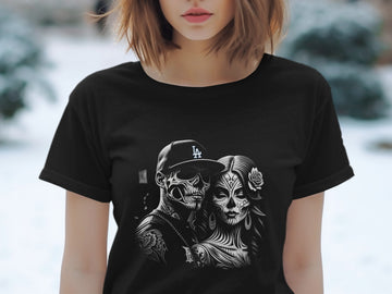 Black t-shirt with Day of the Dead inspired skull couple graphic.